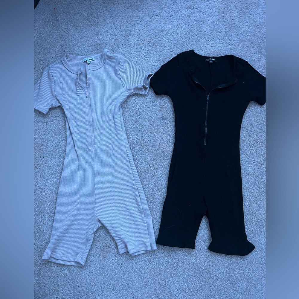 Cream and Black Zip Up One Pieces. Size: S